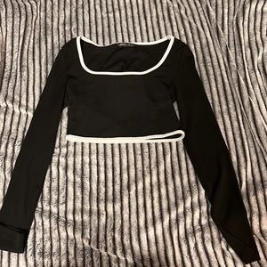 Black cropped long sleeve with white embroidering
